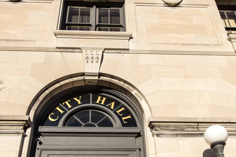Exterior Of Municipal City Hall Sign In Window -cm